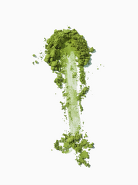 matcha powder brushed vertically on white background